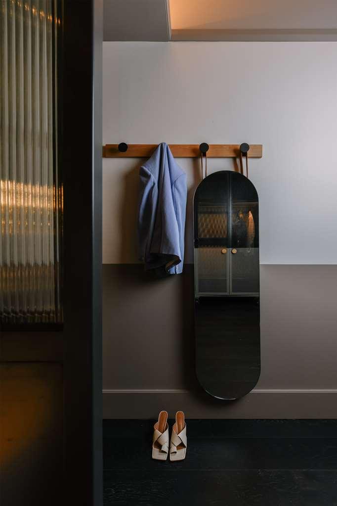 Qt Newcastle Hotel Room photo A coat rack
