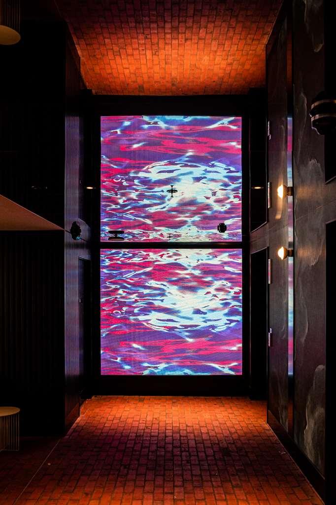 Qt Newcastle Hotel Interior photo The 10-metre-high (33 ft) glass wall in the foyer